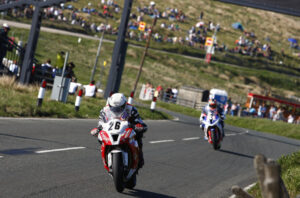 Brian leaves the Bungalow during the Senior TT